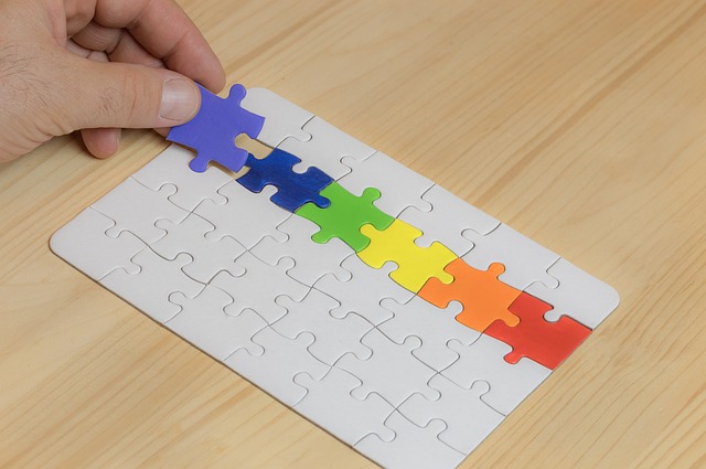 child smiling while solving a colorful wooden puzzle developing cognitive skills
