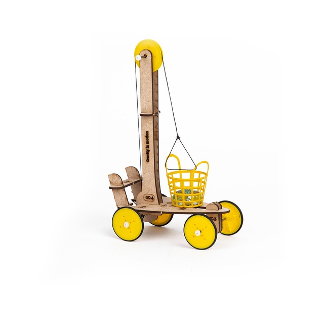 toy designer sketching new educational product concept on paper with prototypes nearby